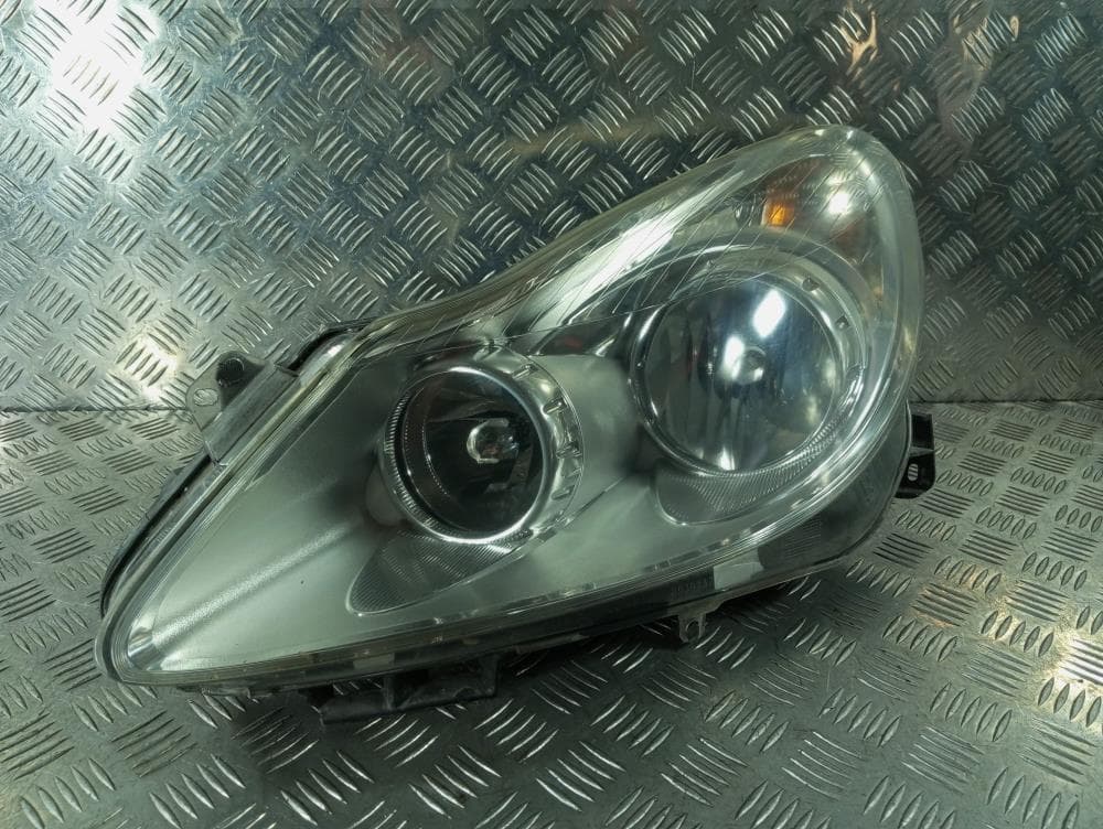Фара левая к Opel Corsa D (06-11)
