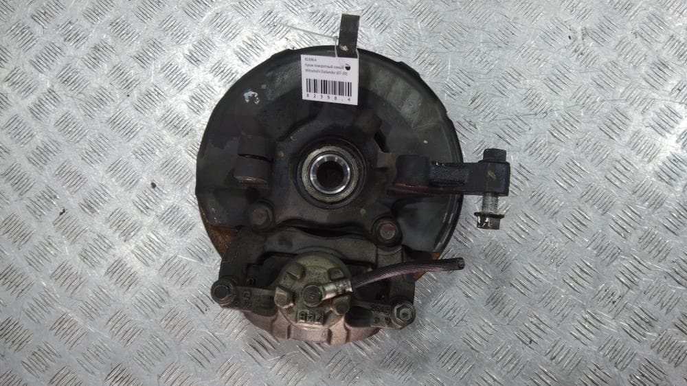 Кулак поворотный левый к Mitsubishi Outlander 2 (07-10)