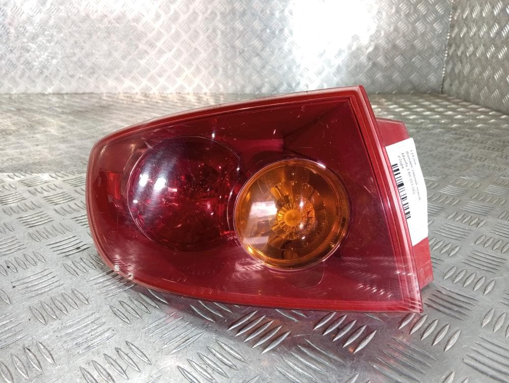 Фонарь задний левый к Mazda 3 BK (03-06)