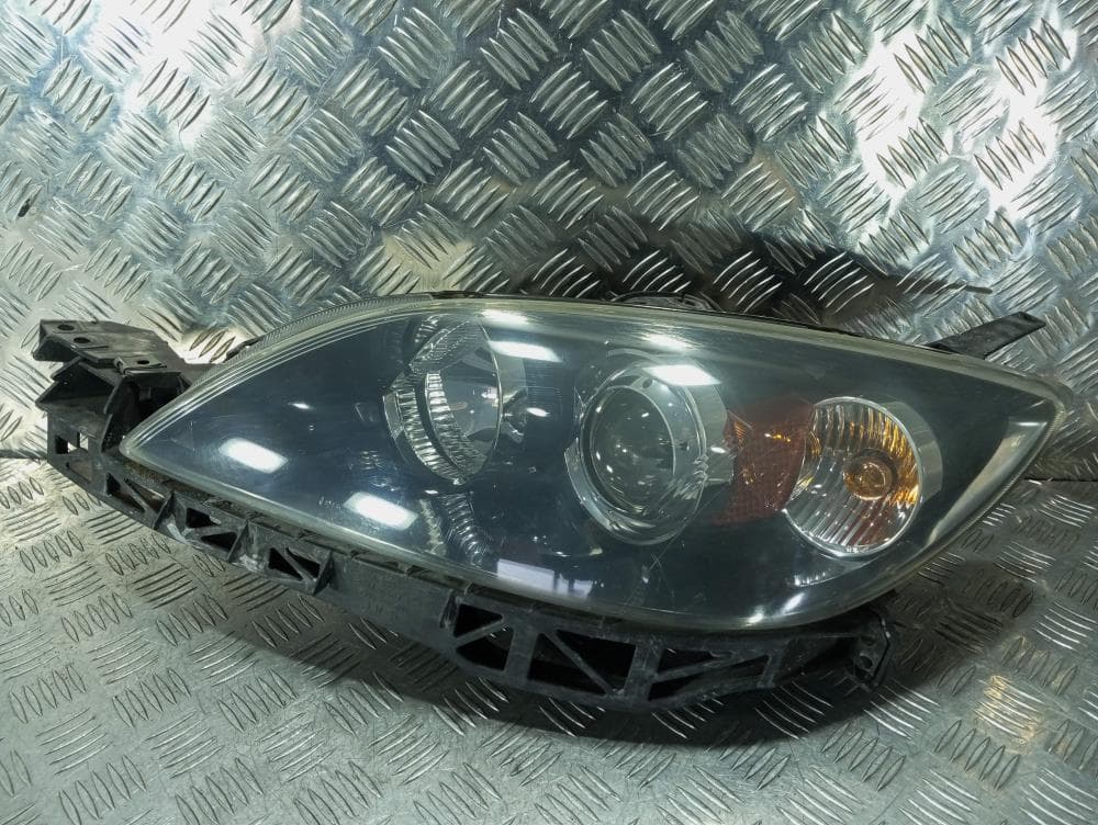 Фара левая к Mazda 3 BK (03-06)