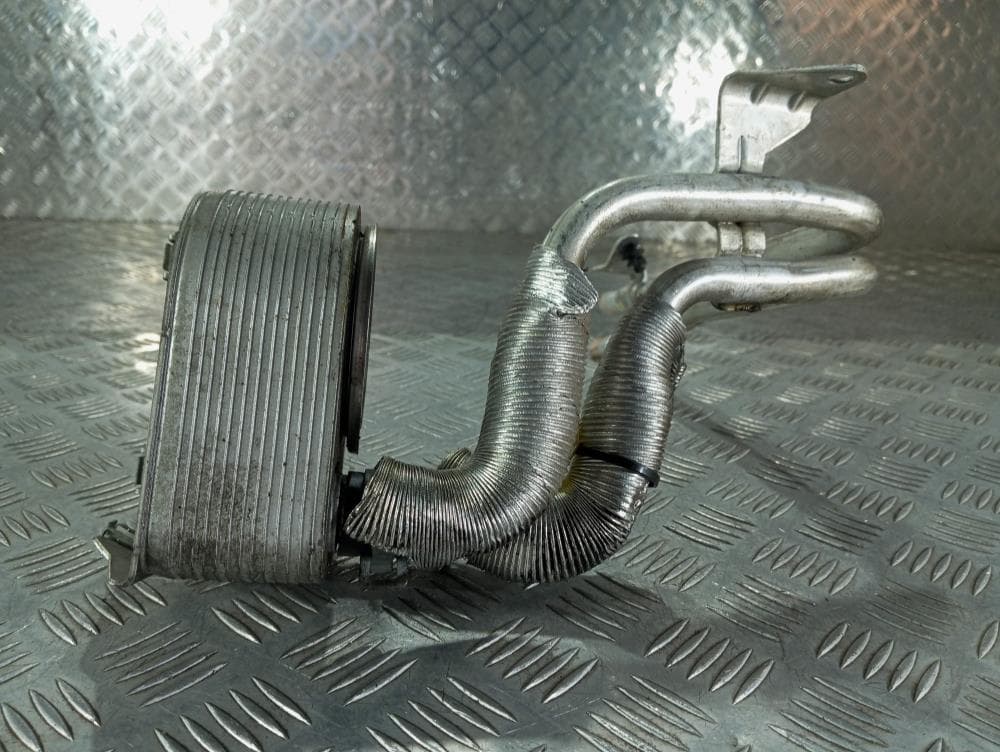 Теплообменник масляного фильтра к Jeep Cherokee KL (13-17)