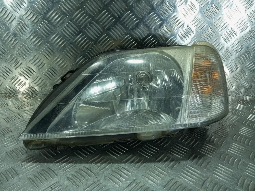 Фара левая к Renault Logan 1 (04-09)