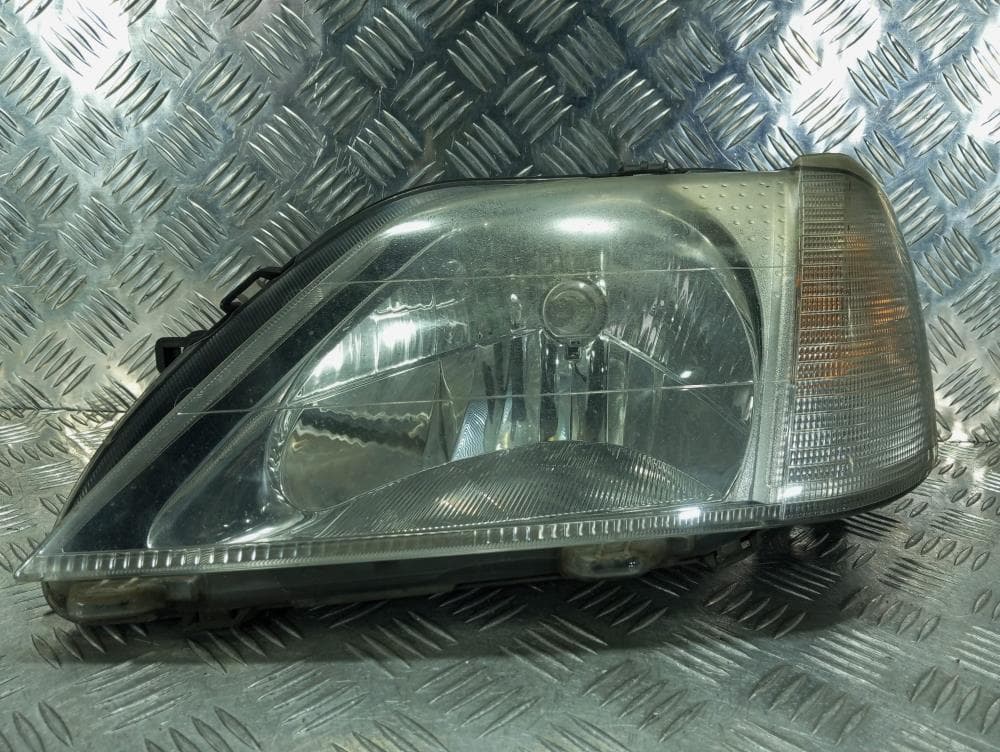 Фара левая к Renault Logan 1 (04-09)