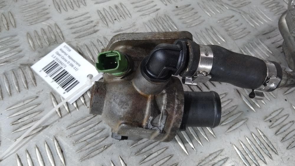 Корпус термостата к Opel Corsa D (06-11)