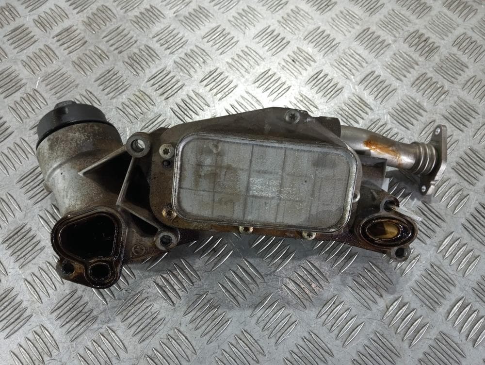 Корпус масляного фильтра к Chevrolet Aveo T250 (06-12)