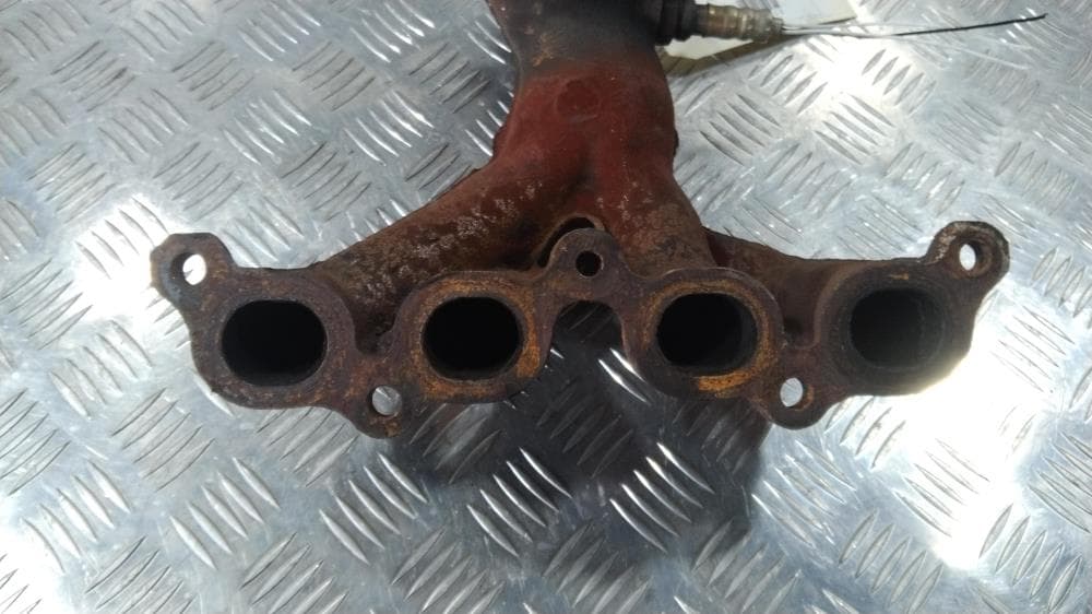 Коллектор выпускной к Nissan  Note E11 (05-09)