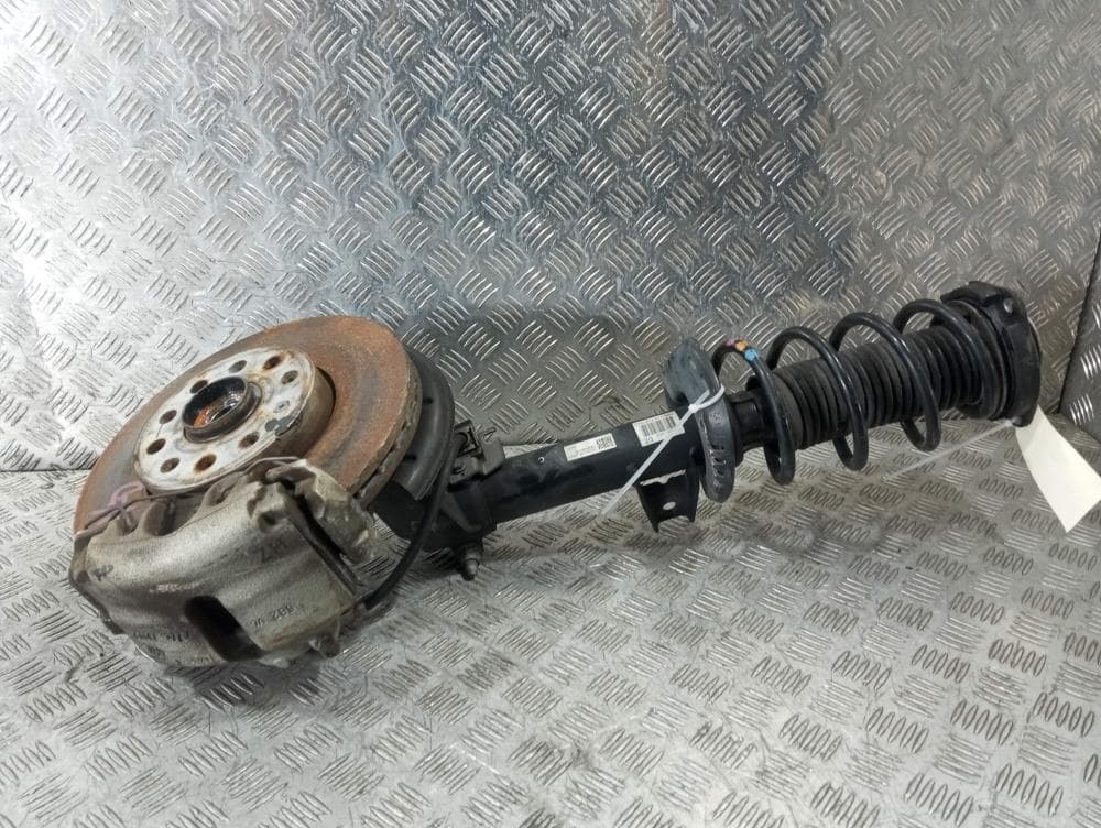 Стойка передняя левая к Volkswagen Passat B7 (10-15)