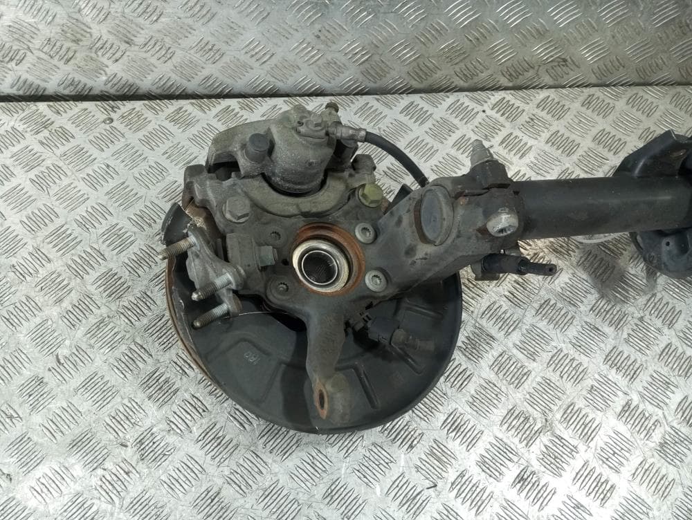 Стойка передняя левая к Volkswagen Passat B7 (10-15)