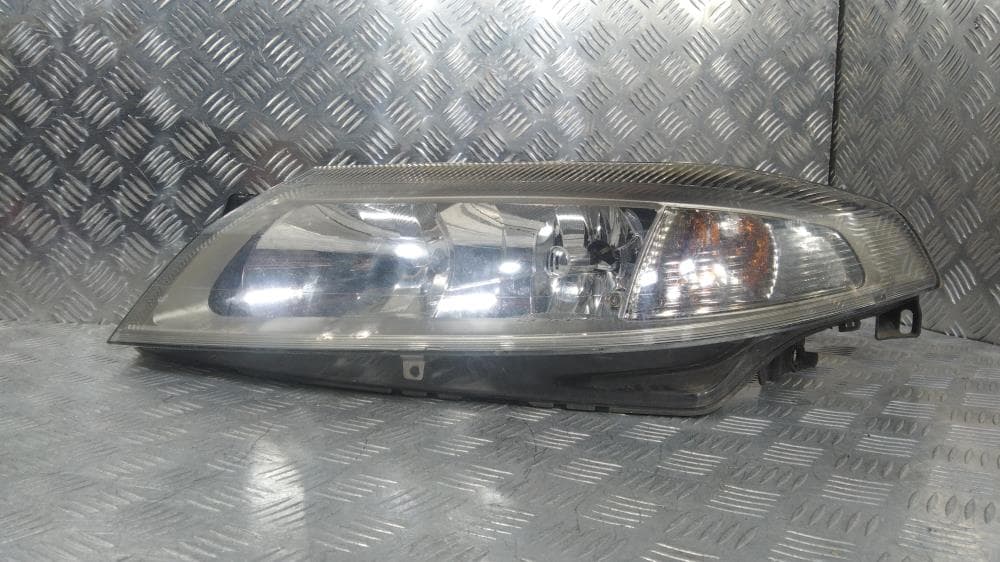 Фара левая к Renault Laguna 2 (01-05)