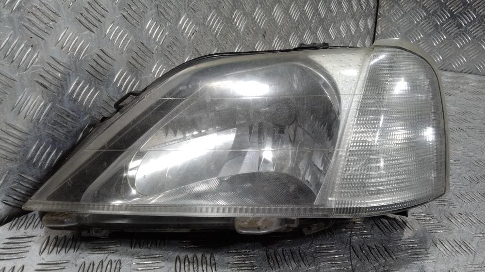 Фара левая к Renault Logan 1 (04-09)