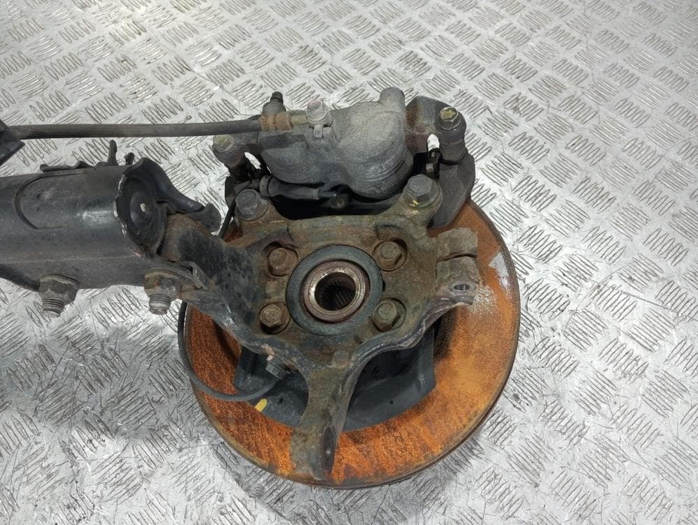 Стойка передняя левая к Nissan  Serena C25 (05-12)