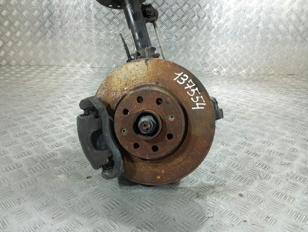 Стойка передняя левая к Opel Corsa D (06-11)