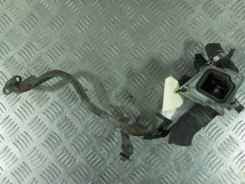 Корпус термостата к Opel Corsa D (06-11)