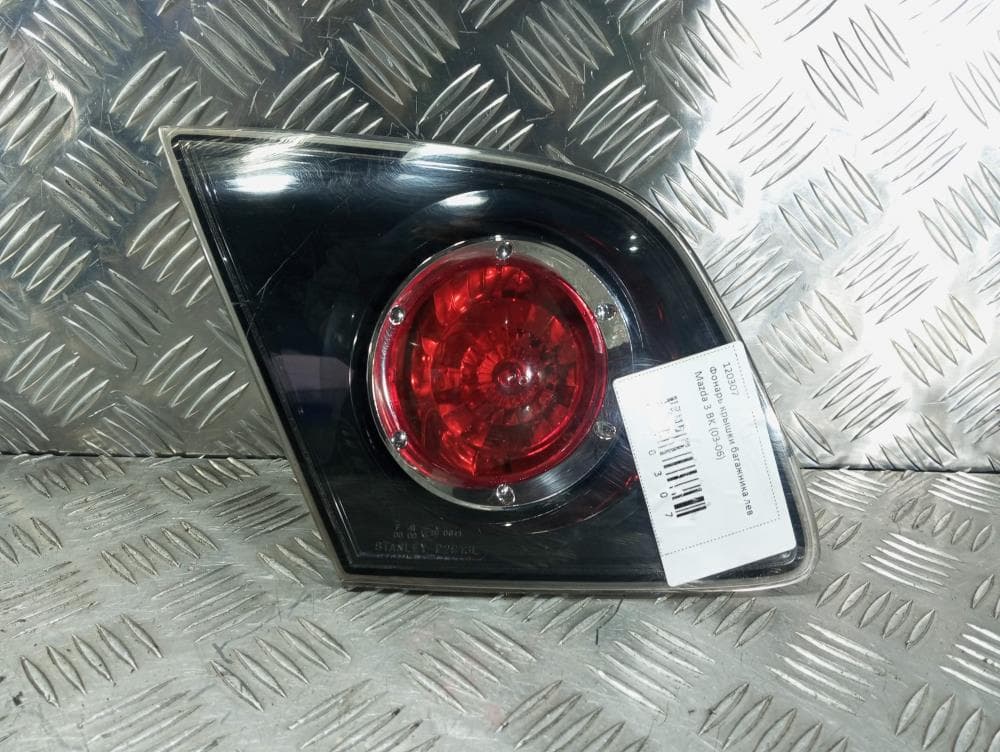 Фонарь крышки багажника левый к Mazda 3 BK (03-06)