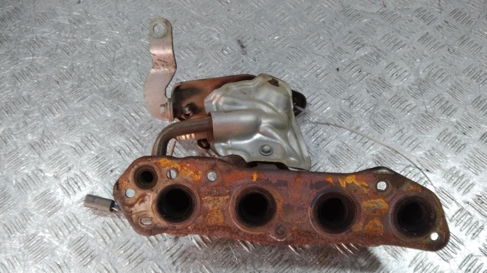 Коллектор выпускной к Nissan  Note E11 (05-09)