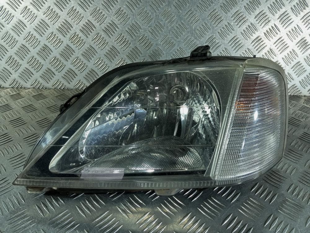Фара левая к Renault Logan 1 (04-09)