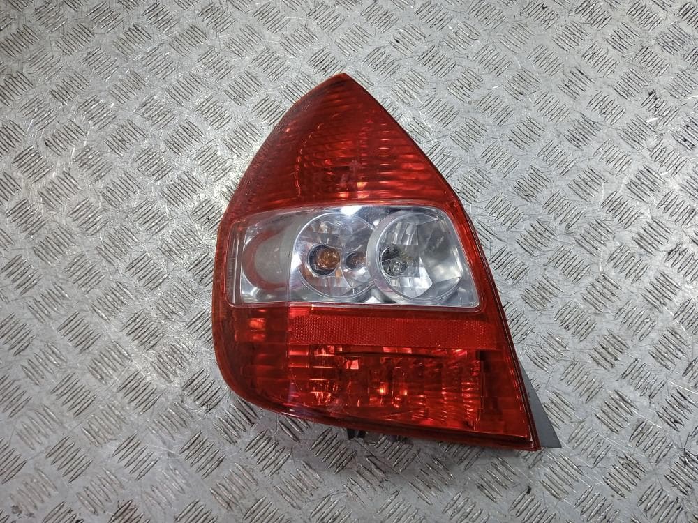Фонарь задний левый к Honda Jazz 1 (01-04)