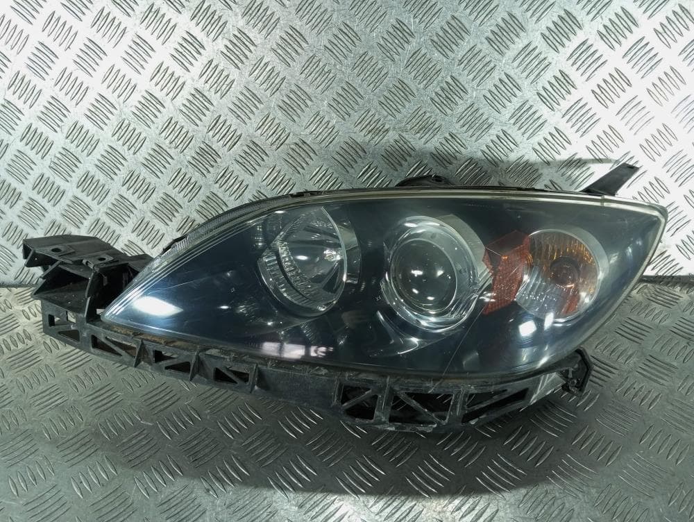 Фара левая к Mazda 3 BK (03-06)