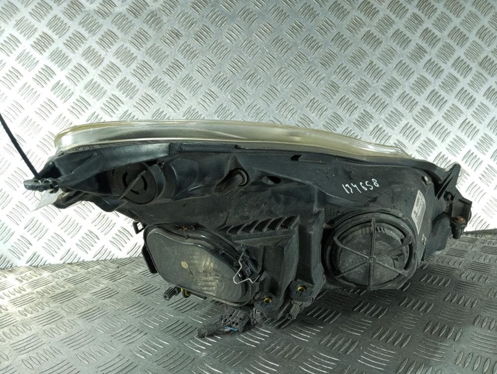 Фара левая к Opel Corsa D (06-11)