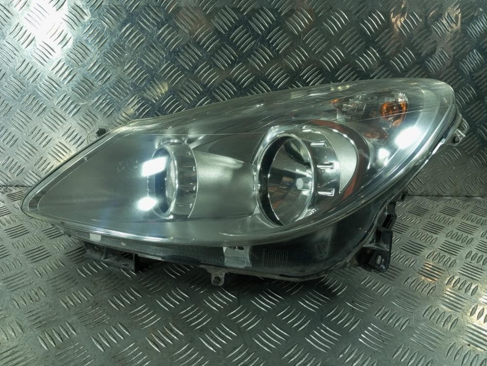 Фара левая к Opel Corsa D (06-11)
