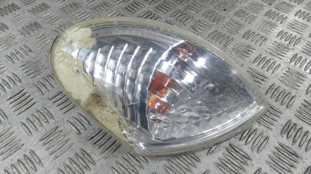 Поворотник левый к Nissan  Almera N16 Рестайлинг (03-06)