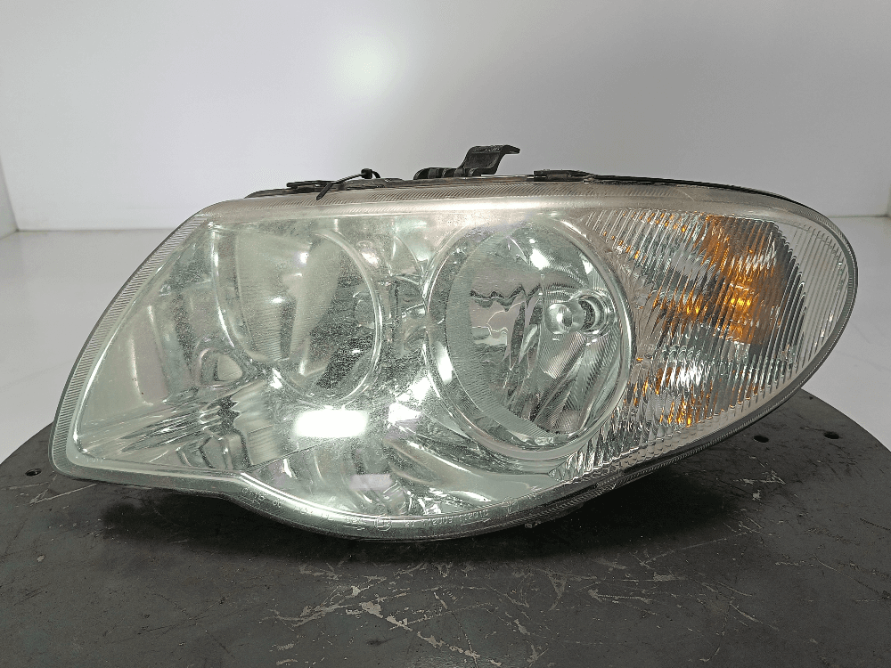 Фара левая к Chrysler Voyager 4 Рестайлинг (04-08)