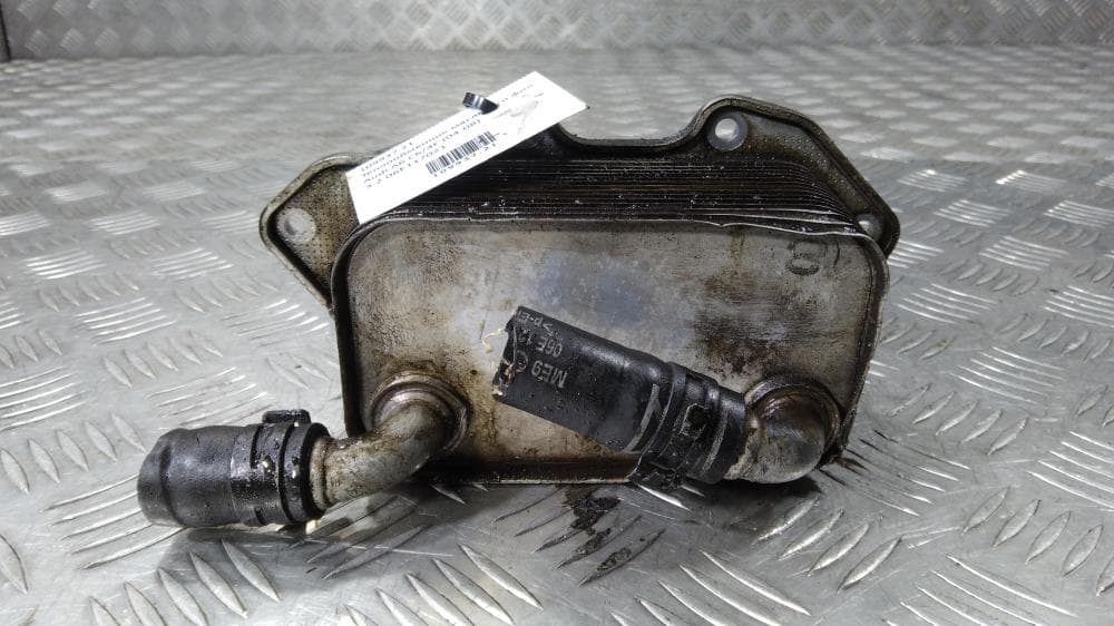Теплообменник масляного фильтра к Audi A6 C6/4F (04-08)