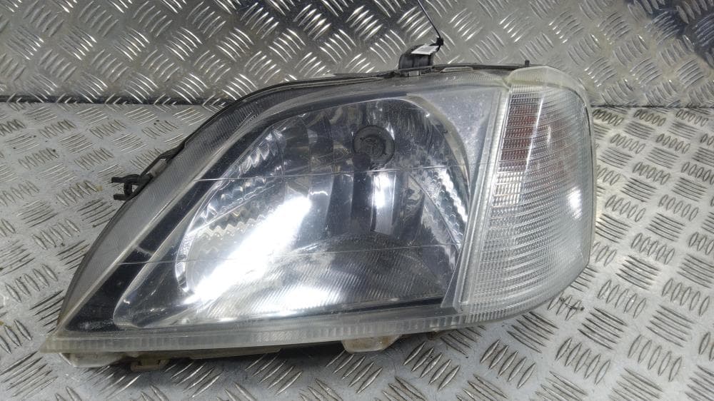 Фара левая к Renault Logan 1 (04-09)